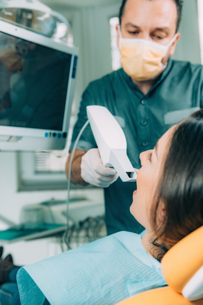 Dentist using dental camera